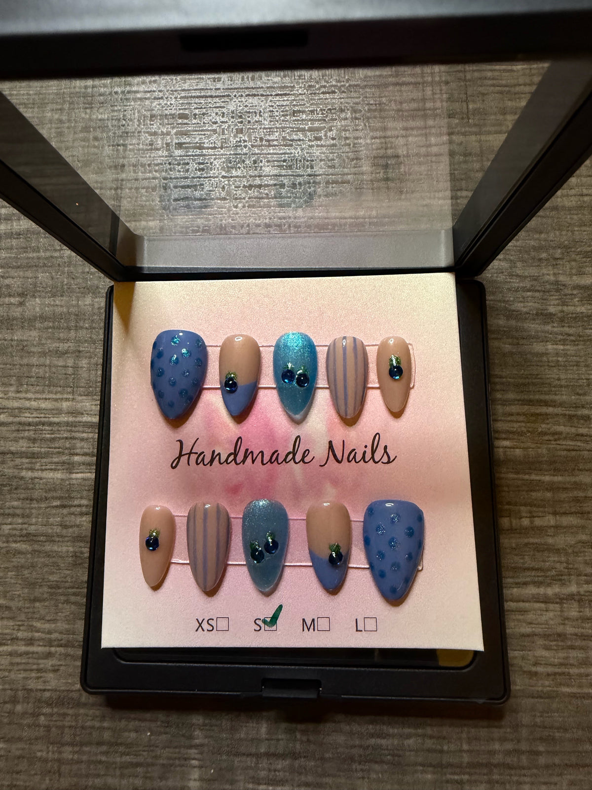 Blueberry Socialite blue and nude rhinestone press on nails
