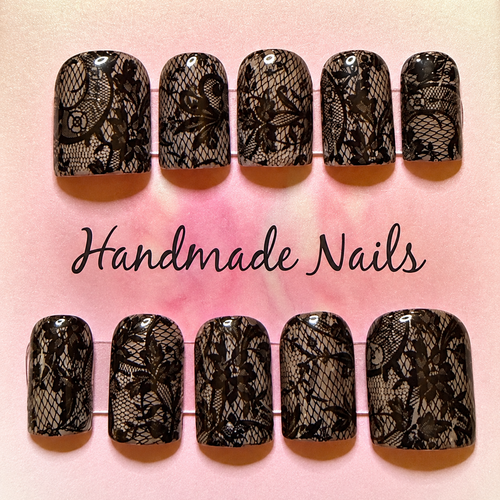 Close-up of Black Lace press-on nail set