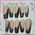 Close-up of Black Lace French press-on nail set
