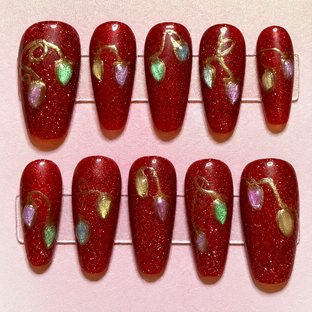 Close-up of Christmas Lights press-on nail set