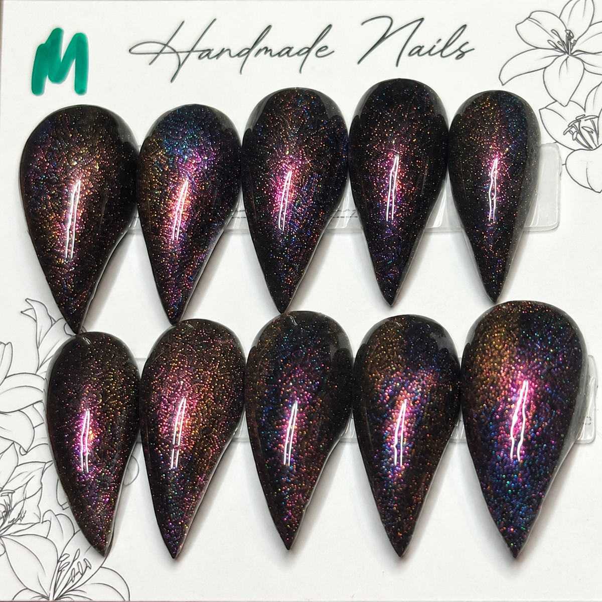 Close-up of Cosmic Ember Claws press-on nail set
