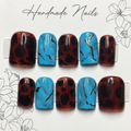 Close-up of Desert Turquoise Tortoise press-on nail set
