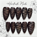 Close-up of Holographic Tiger Cat Eye press-on nail set