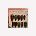Festive red and green shimmering plaid nail art.