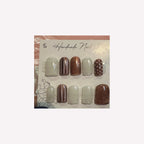 Soft ivory and rose-gold glitter with delicate stripes and polka-dot accents.