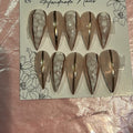 Zoomed and cropped product photo showing handmade press-on nails