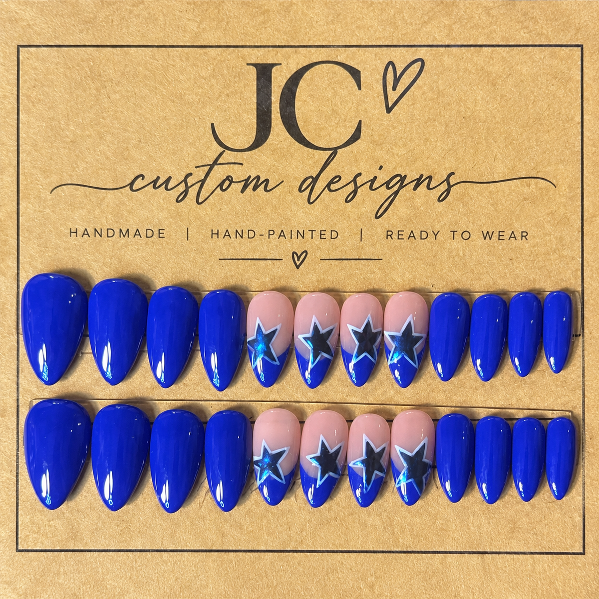 Close-up of Navy Star press-on nail set