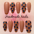 Close-up of Nude Rhinestone press-on nail set