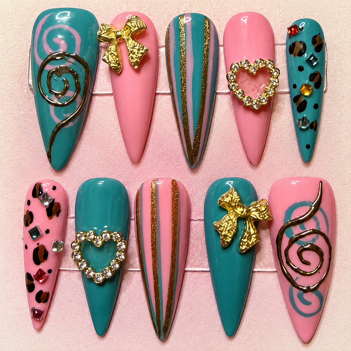 Close-up of Pink & Turquoise Statement press-on nail set