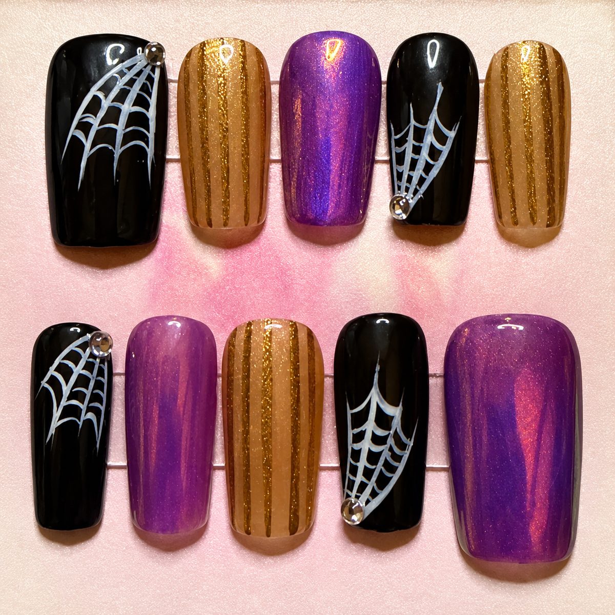 Close-up of Purple Halloween press-on nail set