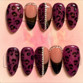 Close-up of Purple Leopard press-on nail set