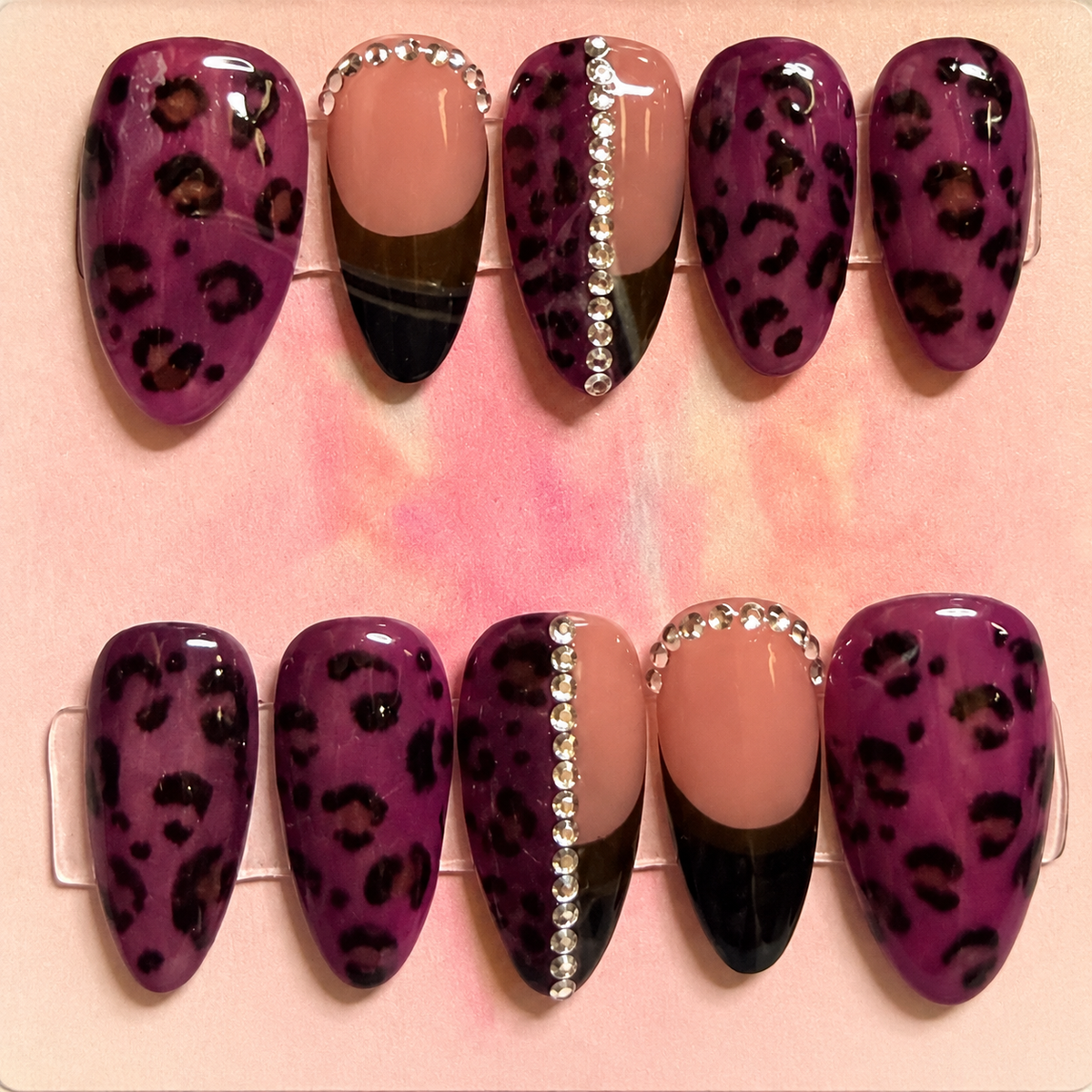 Close-up of Purple Leopard press-on nail set