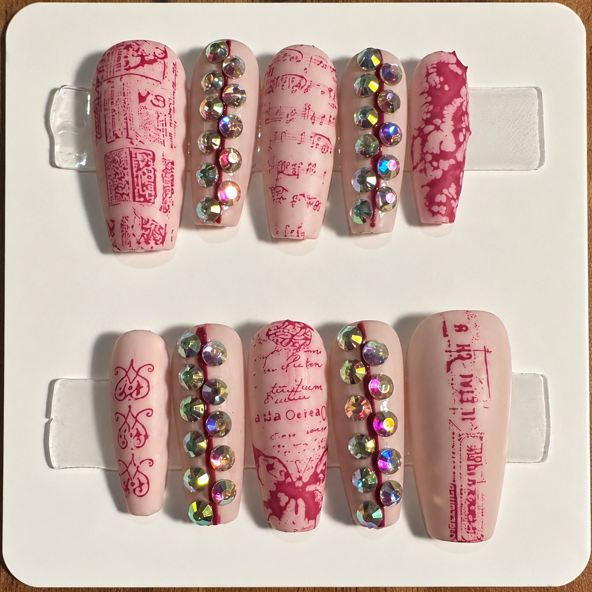 Close-up of the complete ten-nail Red Print set