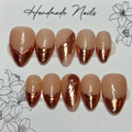 Close-up of Rose Gold Veil press-on nail set