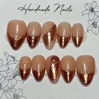 Close-up of Rose Gold Veil press-on nail set