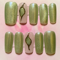 Close-up of Sage Glow press-on nail set