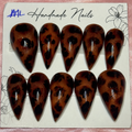 Close-up of Tortoise Claws press-on nail set