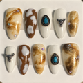 Close-up of Turquoise Renegade press-on nail set